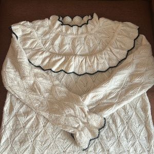 Wool blend high neck ruffle sweater